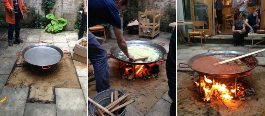 Making a space for the fire pit in the rear courtyard for cooing paella.