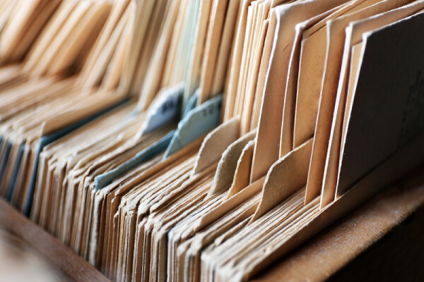 Close-up of a collection of paper files.