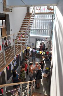 Tenth anniversary party: atrium view down to ground floor from outside unit 4.