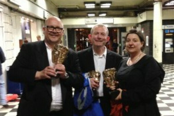 Berger, Robert, Cath with BAFTA awards at Embankment Underground.